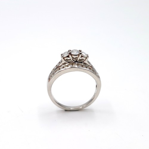 980 - Super Star Lot : A Fabulous very bright  three stone diamond ring set with diamond mount. With over ... 