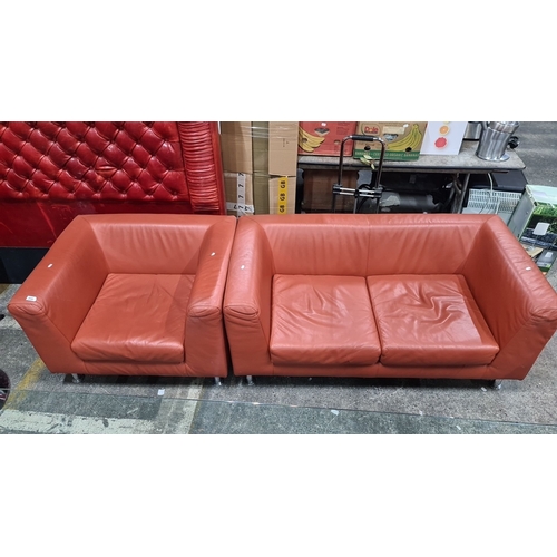 1088 - Star Lot : A Designer Lux leather sofa and armchair set, chrome legs, sofa: 200cm x 85cm x 70cm, arm... 