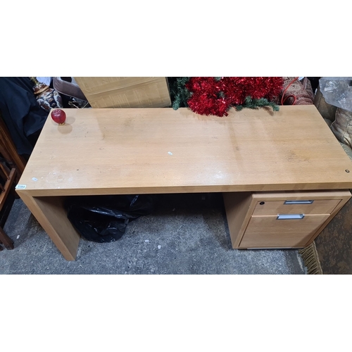 1111 - Wooden desk with integrated storage, features a light oak finish and two drawers.
Previous in auctio... 