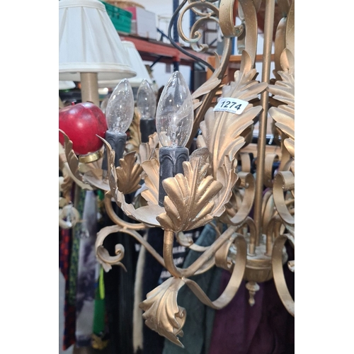 1112 - Star Lot : A fabulous large Ornate gold-tone 8 branch chandelier featuring intricate leaf and scroll... 