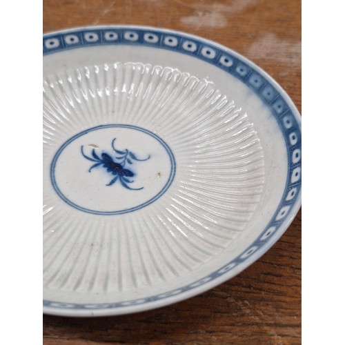 188 - Star Lot: A trio of blue and white 18th-19th century Worcester hard paste porcelain that is reeded w... 