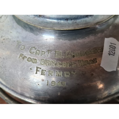 709 - Star Lot : An important Art Deco EPNS teapot with stand. Features an engraving reading 'To Capt. M. ... 