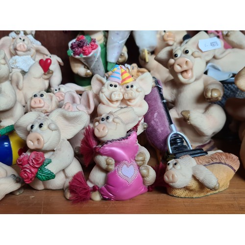 723 - A super large collection of thirty-five Piggin' figurines. Featuring cheerful pigs in many humorous ... 