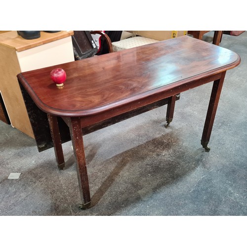 819 - Star Lot : An unusual very versatile Victorian mahogany drop-leaf dining table, circa 1880. Elegant ... 