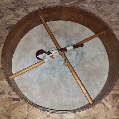 868 - An Irish hand crafted Bodhran musical instrument with Celtic design to centre of skin.