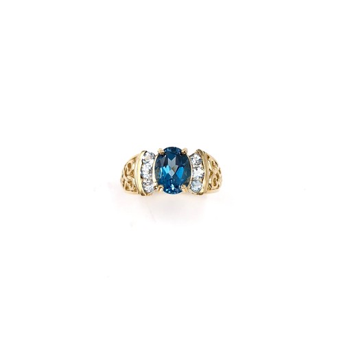 2 - Star lot : A nice example of a large blue topaz stone ring with gemset accents and lovely fretwork s... 