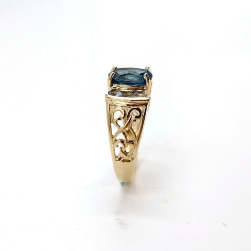 2 - Star lot : A nice example of a large blue topaz stone ring with gemset accents and lovely fretwork s... 