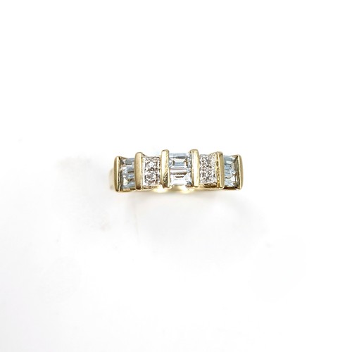 3 - Star lot : An aquamarine and diamond set ring in nine carat gold. Size - K 1/2. Weight - 2 grams.