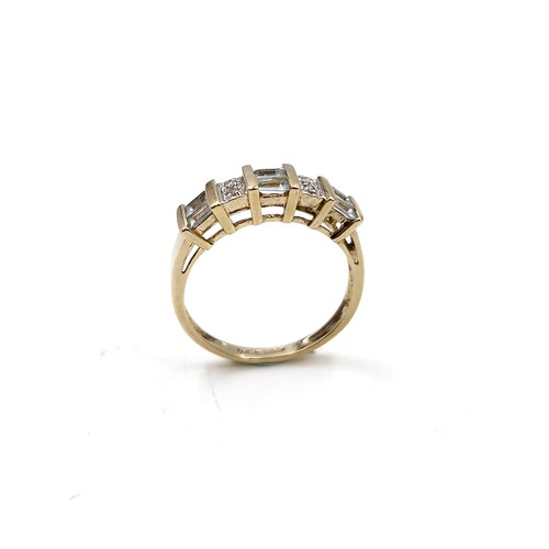 3 - Star lot : An aquamarine and diamond set ring in nine carat gold. Size - K 1/2. Weight - 2 grams.