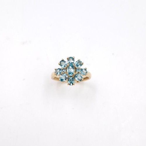 8 - Star lot : A nine carat gold topaz cluster ring. Size - L. Weight - 2.53 grams.