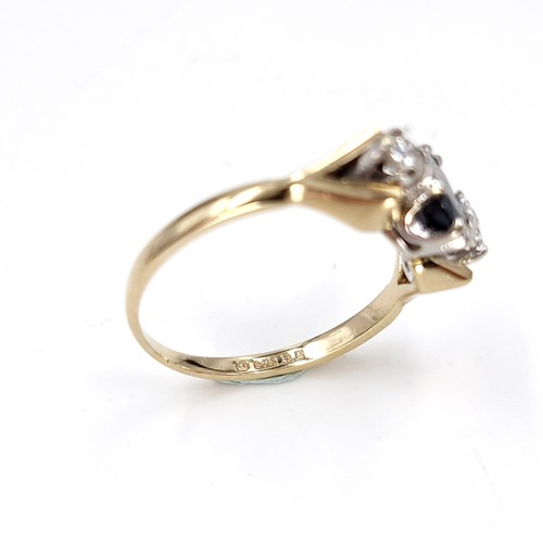 10 - Star lot : A sapphire and diamond ring set in nine carat gold. Size - K 1/2. Weight - 2.1 grams.