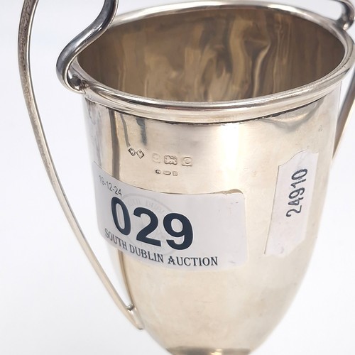 29 - A sterling silver hallmarked Birmingham challenge cup with inscription (Can be removed). Height - 14... 