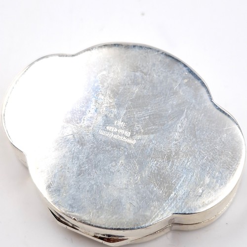 549 - An assayed silver hinged pill box with engine turned detailing. Dimension: 4.5 x 3.5 cms. Weight - 1... 