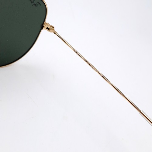 589 - A pair of Ray-Ban aviator sunglasses with metal frames in excellent condition. Lenses clear with no ... 