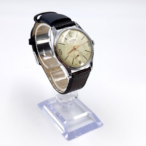 960 - A vintage gents Roamer Standard Incabloc Swiss made, stainless steel watch paired with a black genui... 