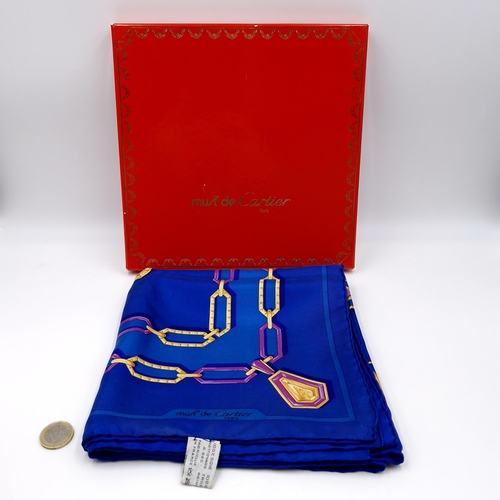 24 - Star Lot : An original fabulous Cartier  must de Cartier Paris silk scarf in original red iconic Box... 