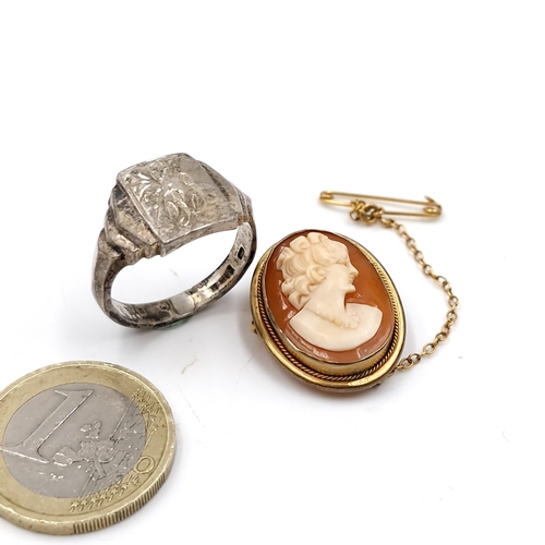 26 - A hallmarked  gents silver signet ring. Size - S 1/2. Weight - 6.34 grams. Together with a gold meta... 