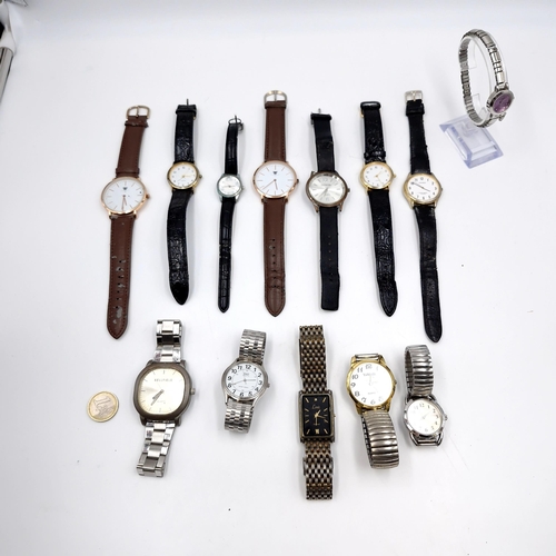 40 - A large collection of 13 watches with metal & leather bracelets. As per photographed.

Note: Due to ... 