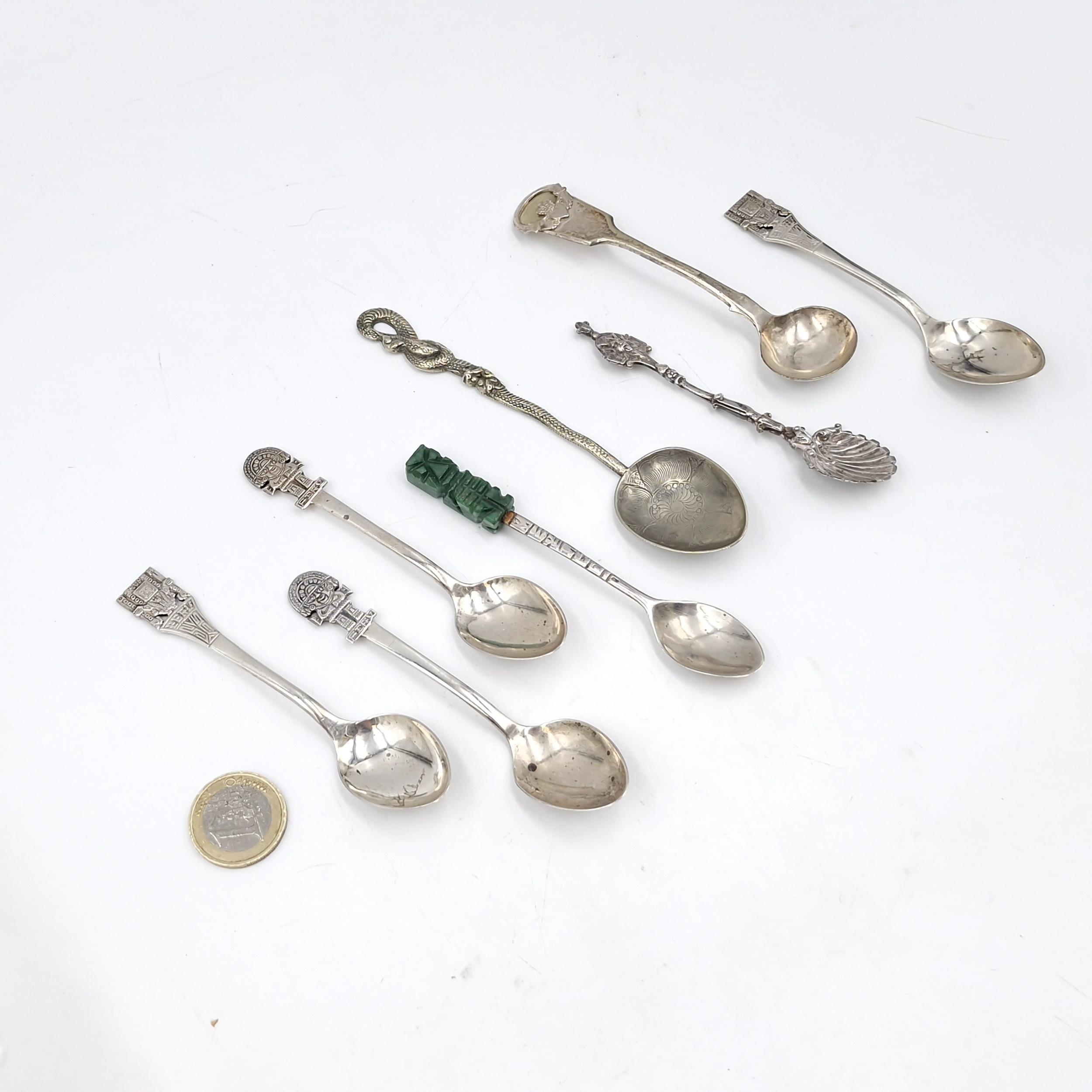 A collection of eight Sterling Silver Collectible tea spoons. Total ...