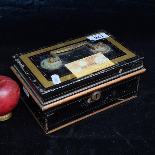 128 - A 1920's antique tin cash box with money tray and brass carry handle.