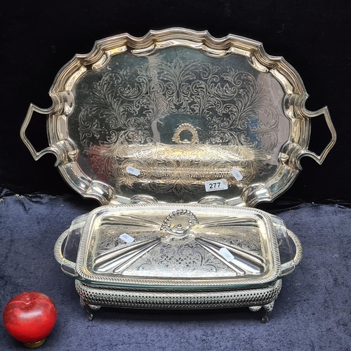 277 - An elaborate English made Cavalier silverplated tray along with silverplated lidded serving dish wit... 