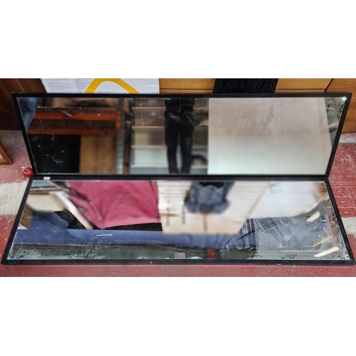 299 - A pair of very large full length / width black framed mirrors. Very heavy pieces. Would suit retail ... 