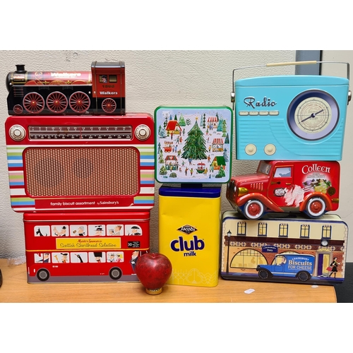 311 - 8 vintage biscuit tins with radio Bus and truck designs.

Note: Due to ESB Emergency Power Maintenan... 