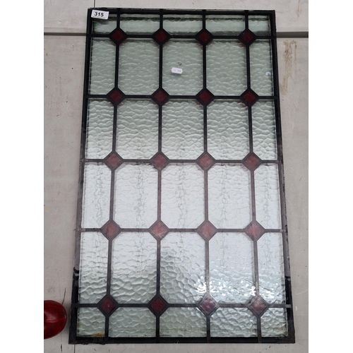 315 - An attractive stained double glass window panel with red diamond pattern. Heavy good weight. 
MM: L ... 