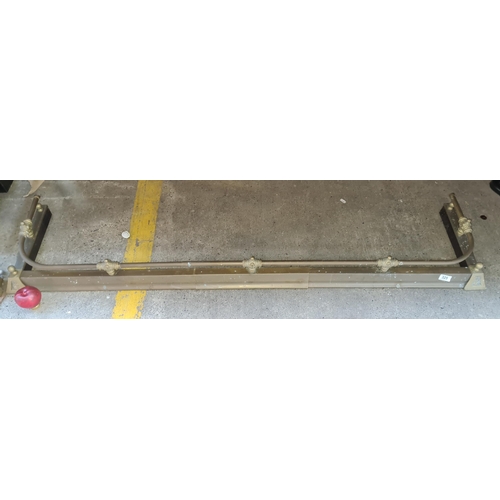 325 - A brass Fire Fender with raised rail. Appox 60 