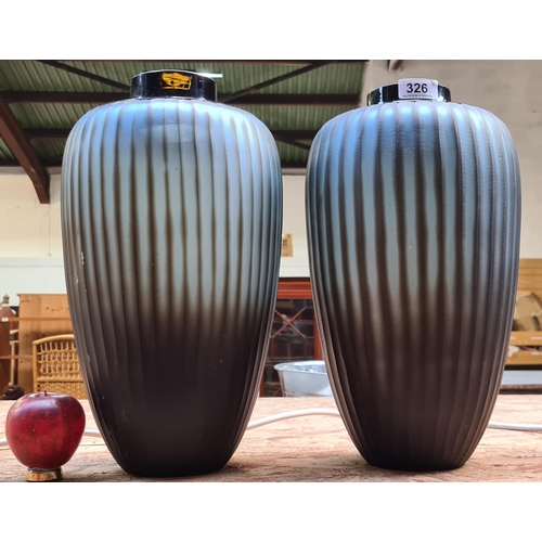 326 - A pair of ribbed ceramic vases with matte finish. Very sleek and modern design.