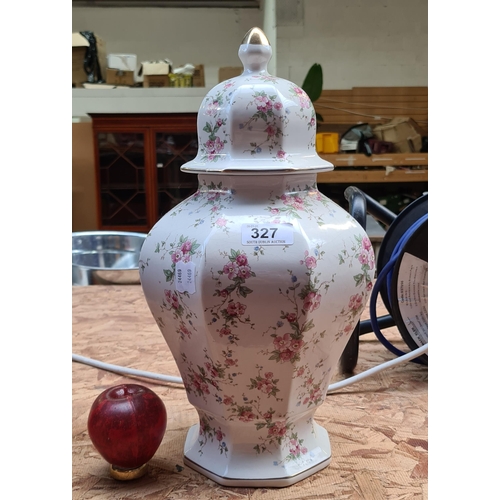 327 - A charming large floral ceramic vase complete with lid.