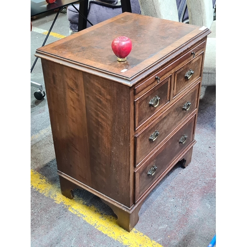 355 - A beautifully crafted antique bachelors chest of drawers fitted with solid brass drop leaf handles, ... 