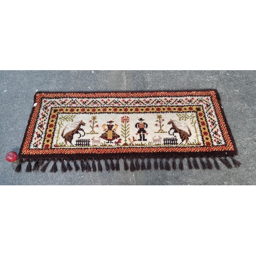 380 - A hand knotted German mid century wool tapestry wall hanging by Jurghans.
MM: 70cm X 155cm


Note: D... 