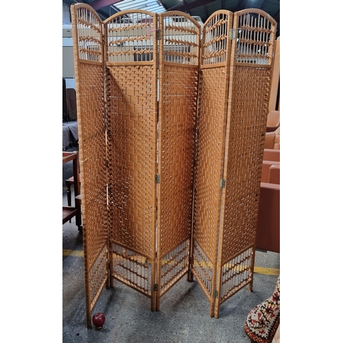 382 - A vintage woven rattan room divider.