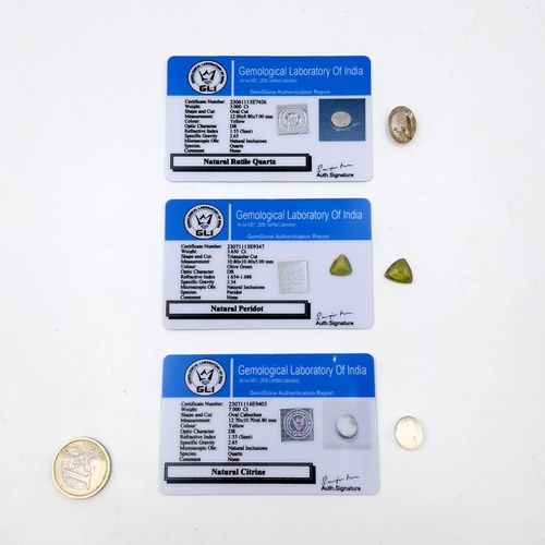 Three certified gemstones  including a 5.000 Ct oval cut natural rutile quartz, a 3.650 Ct triangular cut natural peridot, and a 7.000 Ct oval cabochon cut natural citrine. Includes certificate of authenticity.