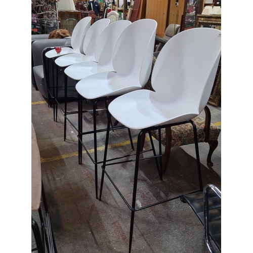 991 - Set of five modern designer moberaris white bar stools with sleek black metal frames.
Previous in au... 