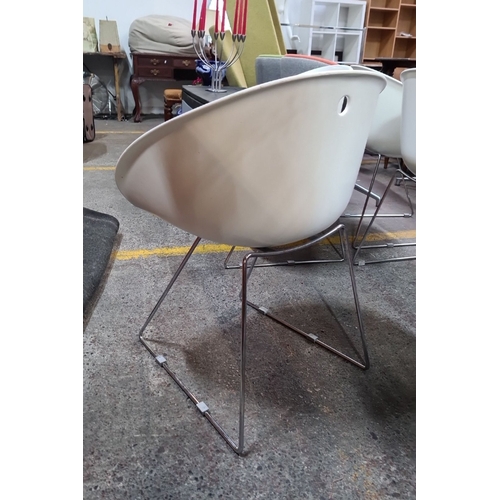 993 - Star Lot : Pair of Pedrali 921 Gliss modern white molded chairs with sleek chrome legs, made in Ital... 