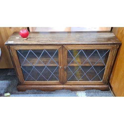 994 - Vintage oak display cabinet with leaded glass doors, from the mid-20th century. Sturdy shelves. Time... 