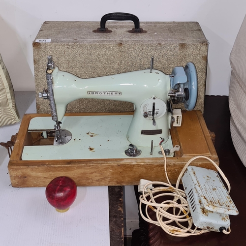 1004 - A fab vintage Brother sewing machine motor in a pastel green. 220-250v. Complete with original carry... 