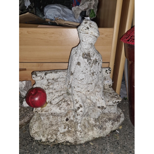 1007 - A charming heavy garden reconstituted stone figure. Features a gentleman sat upon a bench.
Previous ... 