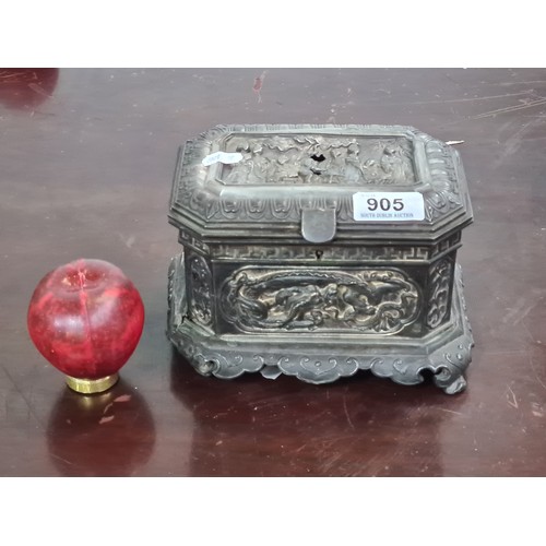 1050 - An eye catching Antique Chinese tobacco canister intricate carvings and embossed designs of dragons ... 