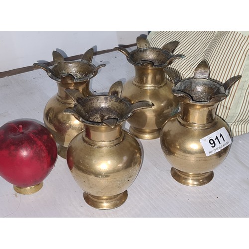 1052 - Four vintage solid brass baluster bud vases.
Previous in auction on 24.12.24 with Lot no.911