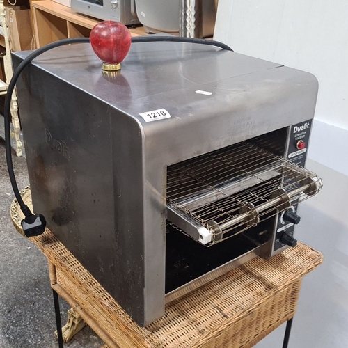 1055 - Star lot : Dualit Conveyor Toaster, stainless steel, featuring adjustable toasting settings and powe... 