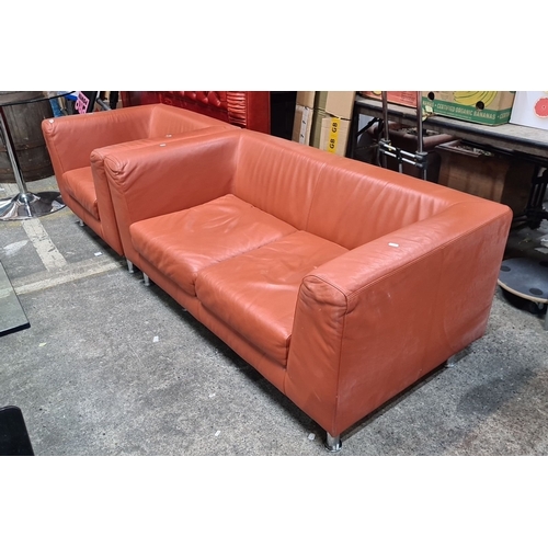 1089 - Star Lot : A Designer Lux leather sofa and armchair set, chrome legs, sofa: 200cm x 85cm x 70cm, arm... 