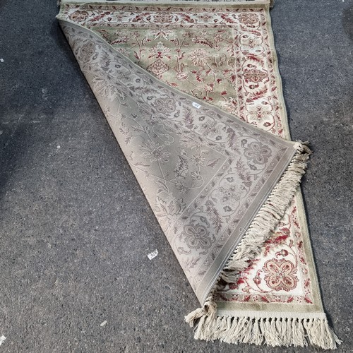 331 - A nice Antigua floor rug in nice natural colours 185cm x 120cm soft to the touch.