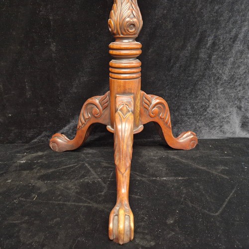 103 - A very handsome vintage intricately carved plant stand with tripod base. Features a barely twist col... 