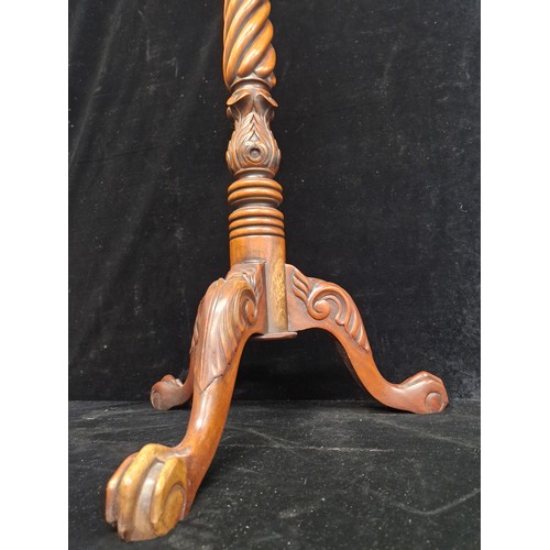 103 - A very handsome vintage intricately carved plant stand with tripod base. Features a barely twist col... 