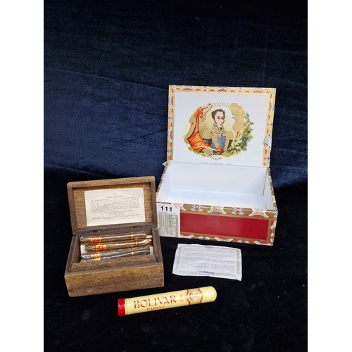 111 - A Bolivar Habana Havana Cuban box containing a Bolivar cigar, along with a Duya Cigarillos wooden ci... 