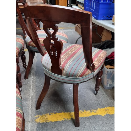 339 - Star Lot : An elegant set of six heavy rosewood, Victorian style splat back dining chairs, boasting ... 