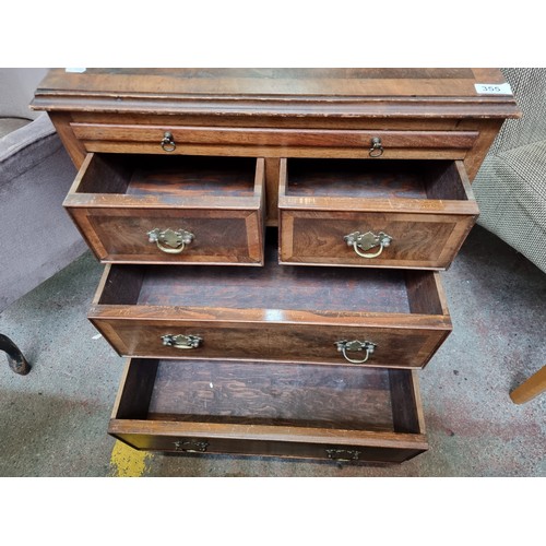 355 - A beautifully crafted antique bachelors chest of drawers fitted with solid brass drop leaf handles, ... 